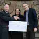 Cheque being presented by Andrew Brownsword