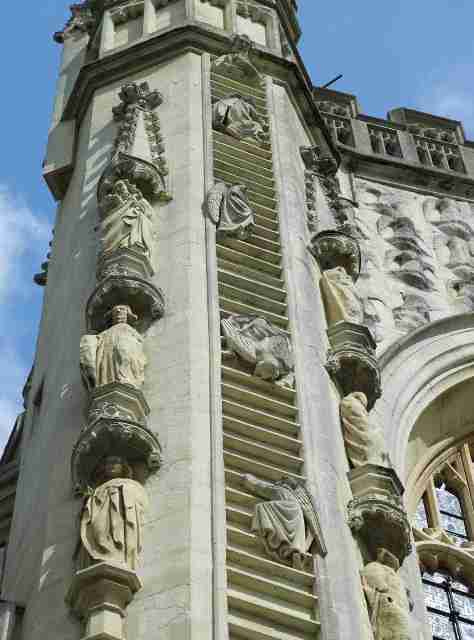 Bath Abbey's Ladders of Angels - an stone architectural features of angels climbing up a ladder on the front of Bath Abbey