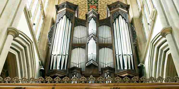 A view looking up at the pipes of the Klais Organ at Bath Abbey