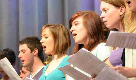 A visiting choir singing at Bath Abbey