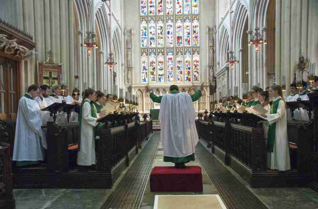 Bath Abbey choirs of Girls and Lay-clerks singing at a service