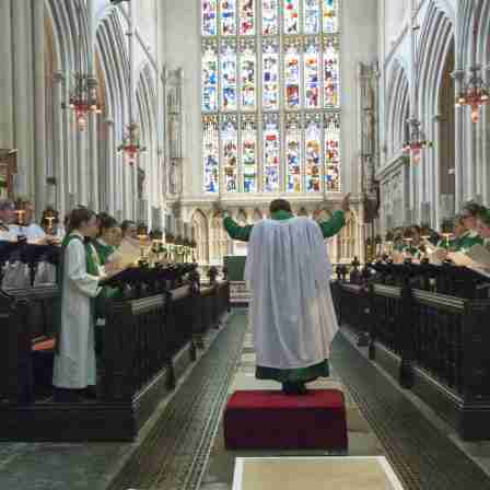 Bath Abbey choirs of Girls and Lay-clerks singing at a service