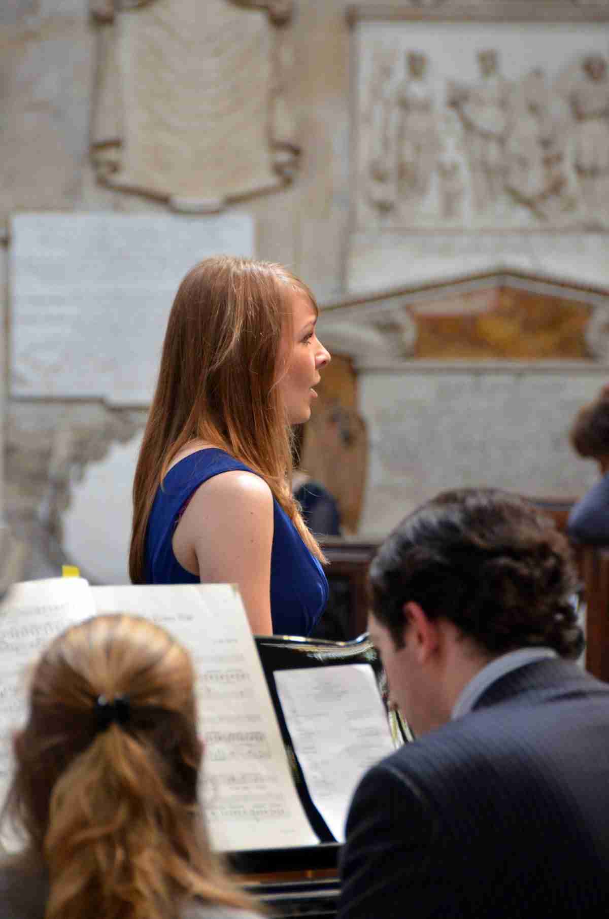 Female singer performing a solo in Bath Abbey