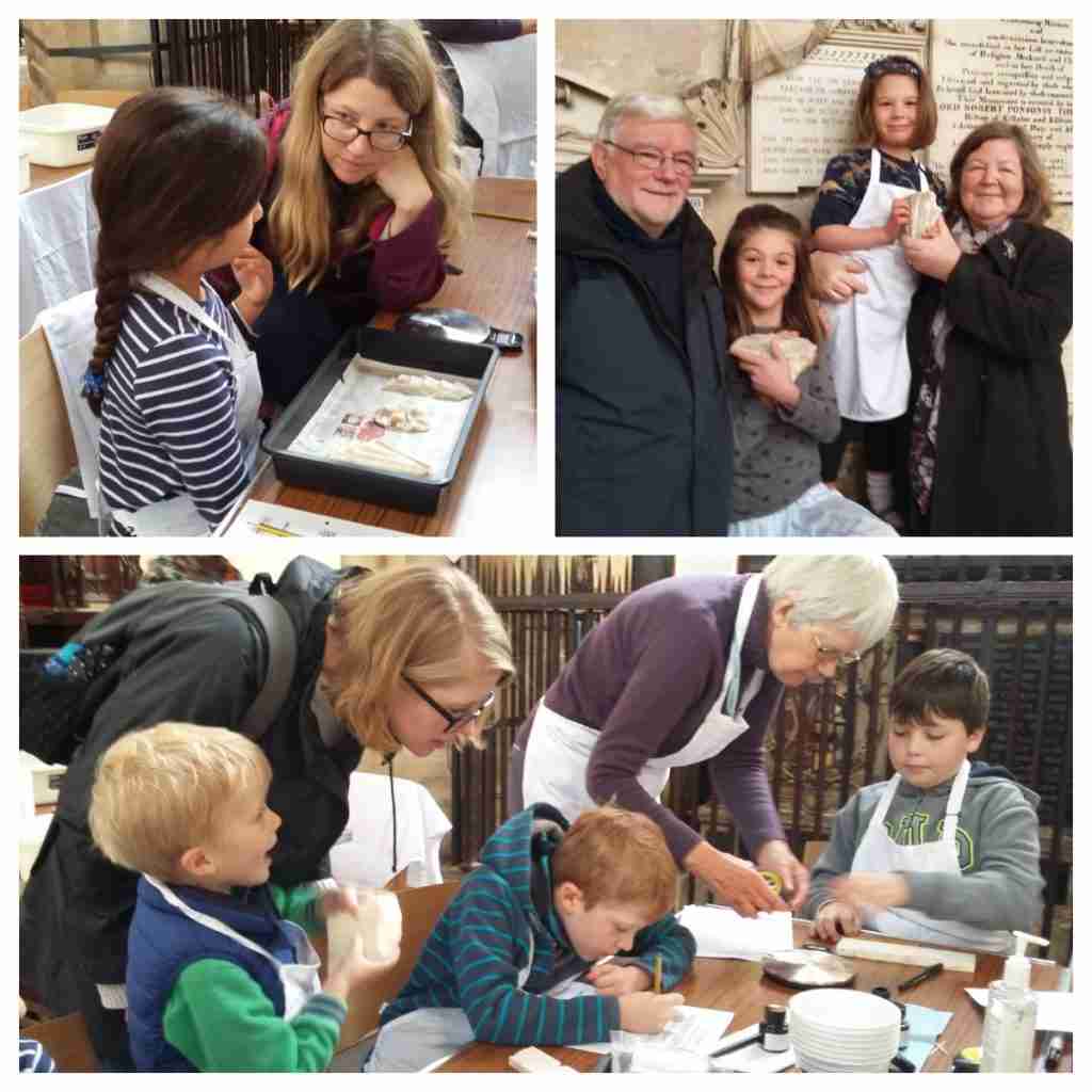 Children enjoying cleaning and recording marble fragments as part of a hands-on archaeological activity at Bath Abbey