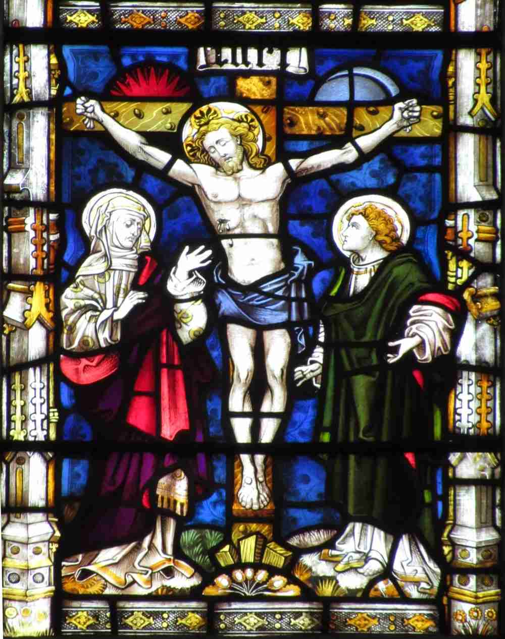 Stained glass window depicting Christ Jesus on cross