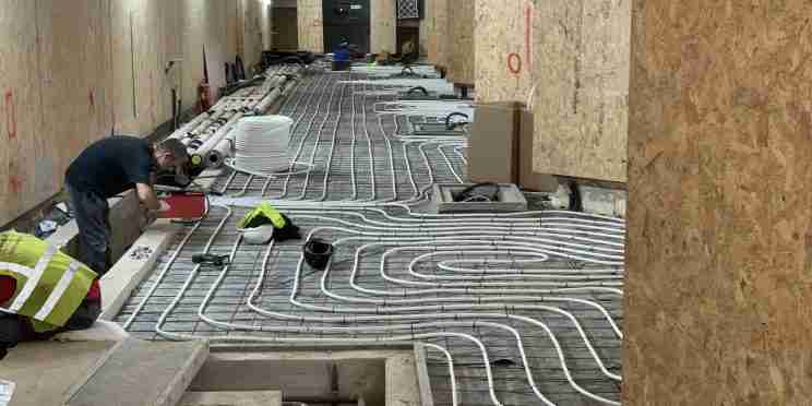 Underfloor heating pipes being laid in the Abbey as part of the Footprint project