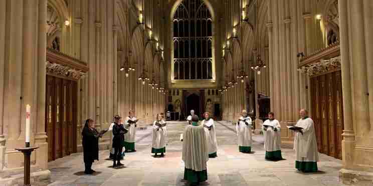 Bath Abbey Choir of Lay Clerks singing in Bath Abbey while socially distanced