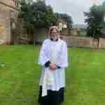 Cath Candish in clergy robes pictured after her ordination service at Wells Cathedral