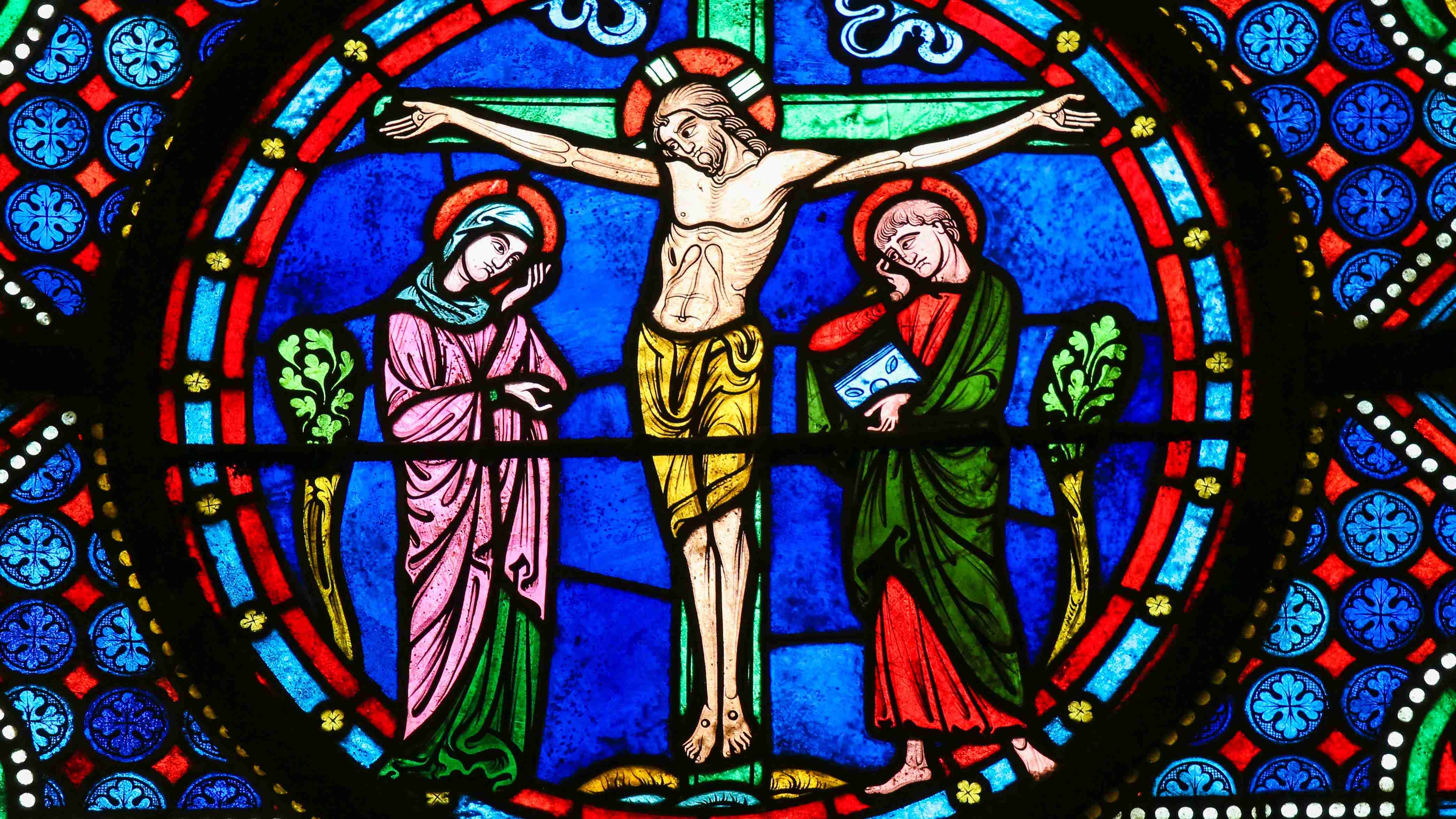 Christ on a cross stained glass window