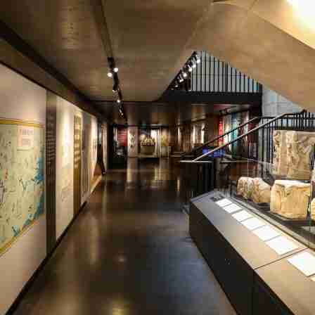 Discovery Centre with medieval stonework and illustrated map
