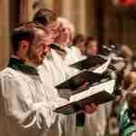 Choirs performing at the Advent Carol Service in Bath Abbey
