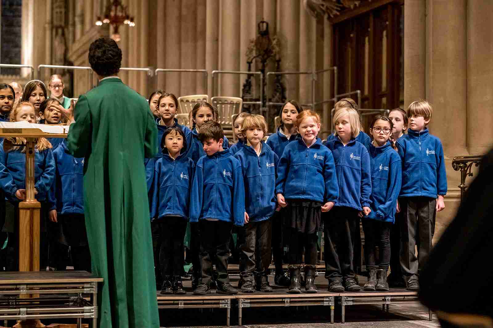 Members of young children's choir performing